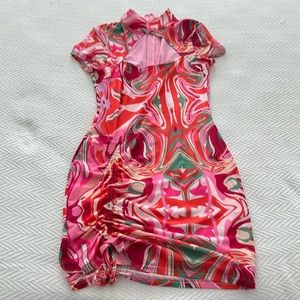 Akira dress in bright festive colors. Size M. Great for a day out or vacation.
